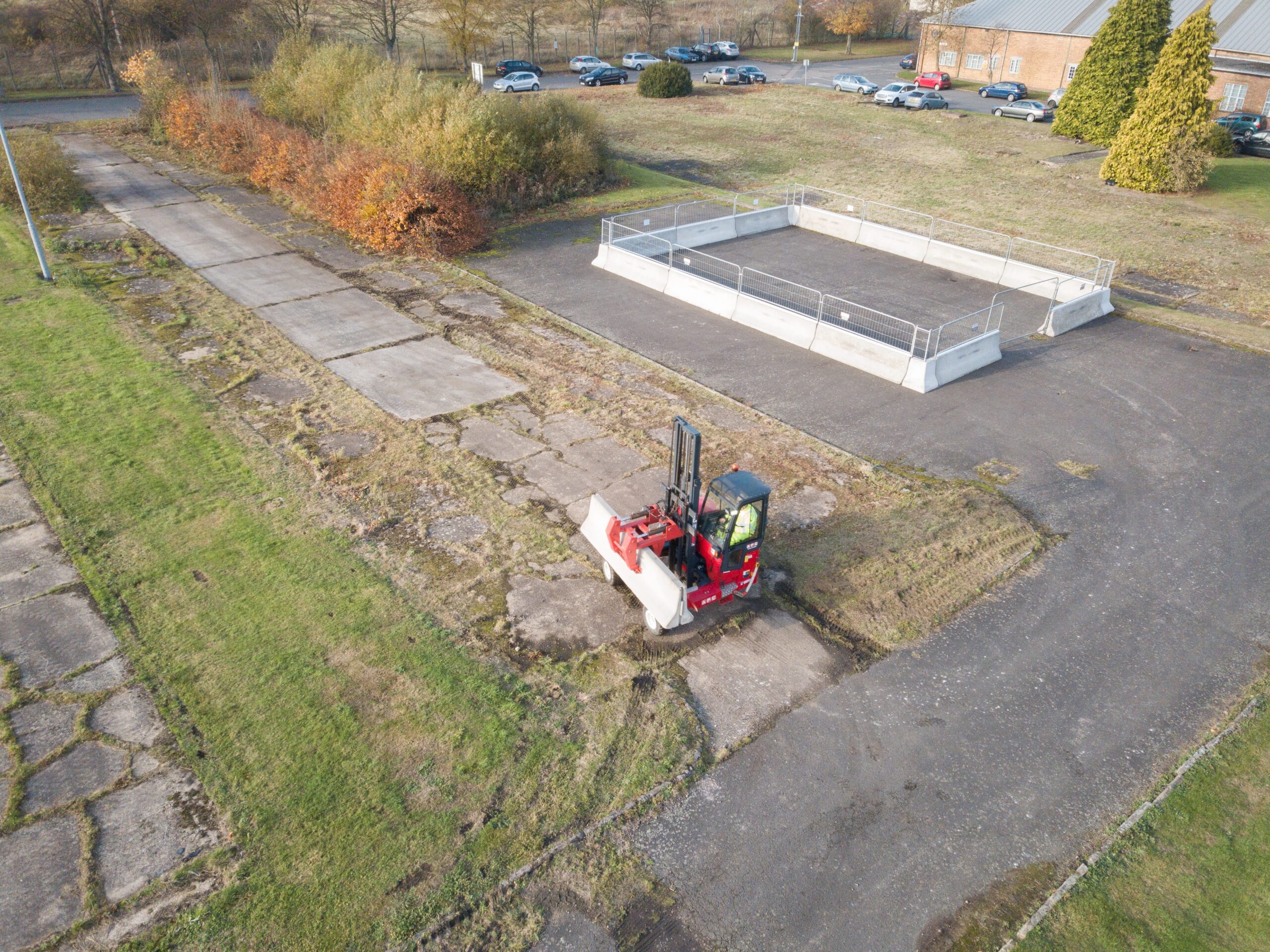 barriers with fence and forklift