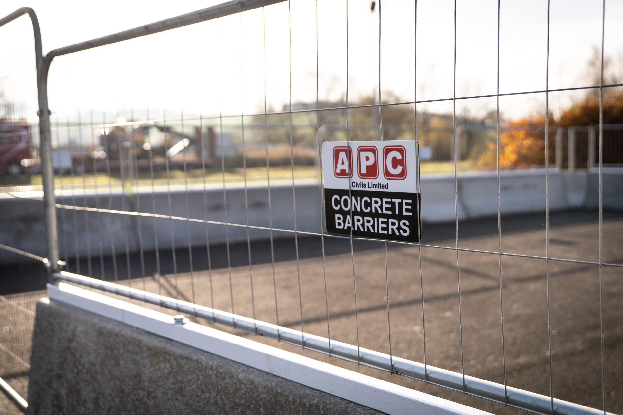 apc logo on fence