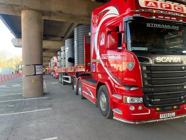 trucks under bridge