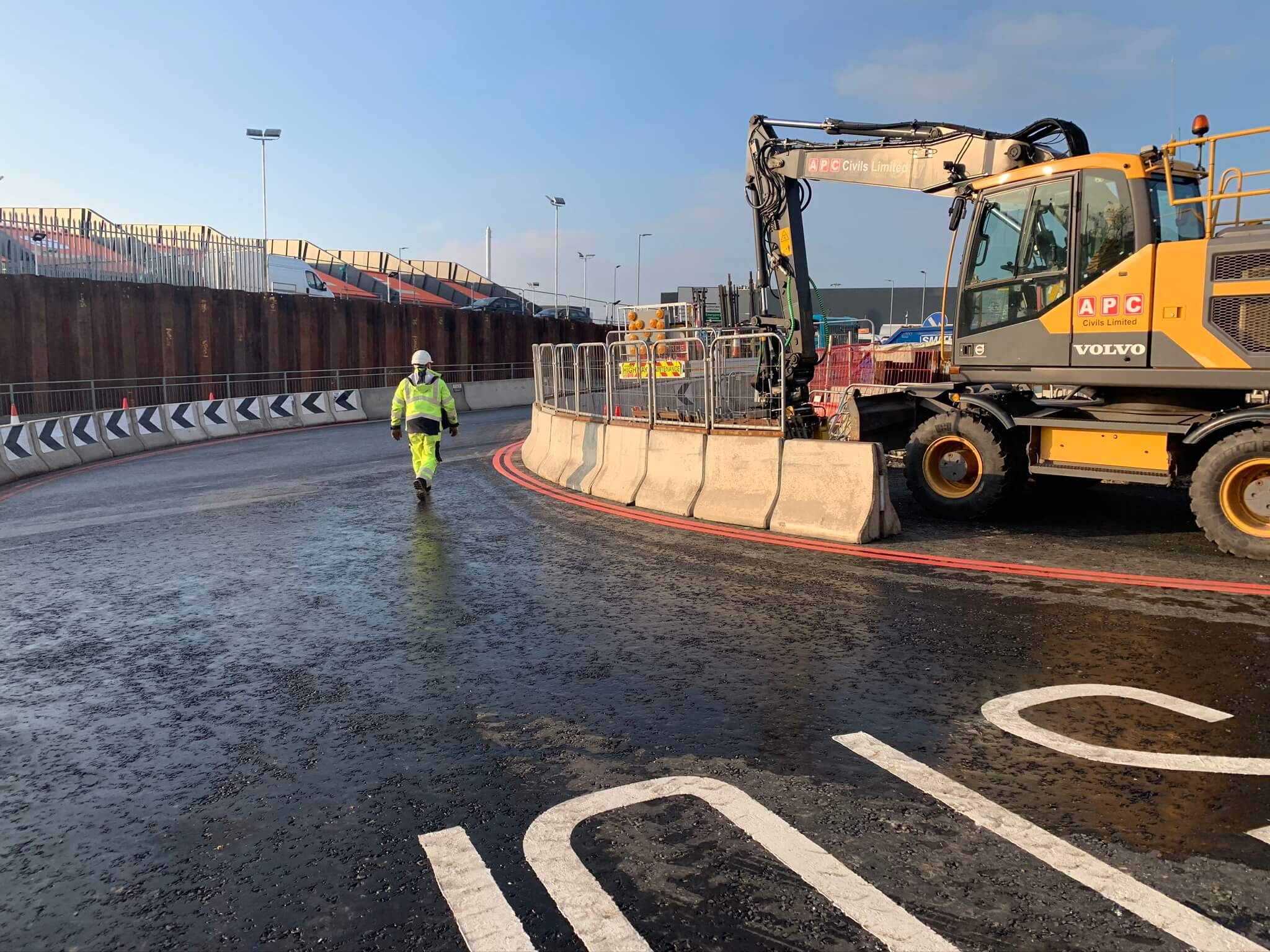 excavator and fence